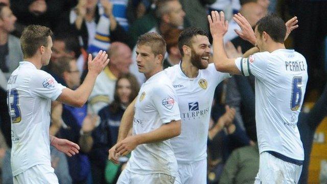 Mirco Antenucci (second right) celebrates the second goal in Leeds United's win over Huddersfield Town