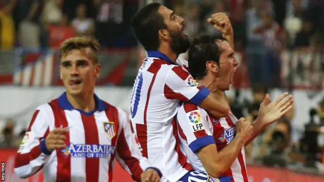 Diego Godin celebrates putting Atletico Madrid in front