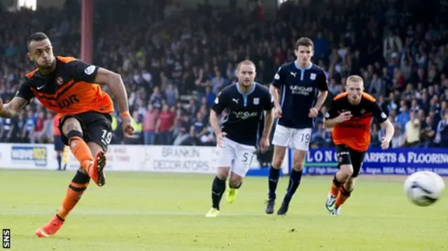 Mario Bilate scores from the penalty spot.