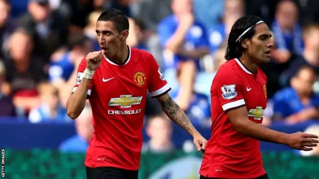 Angel Di Maria (left) celebrates scoring