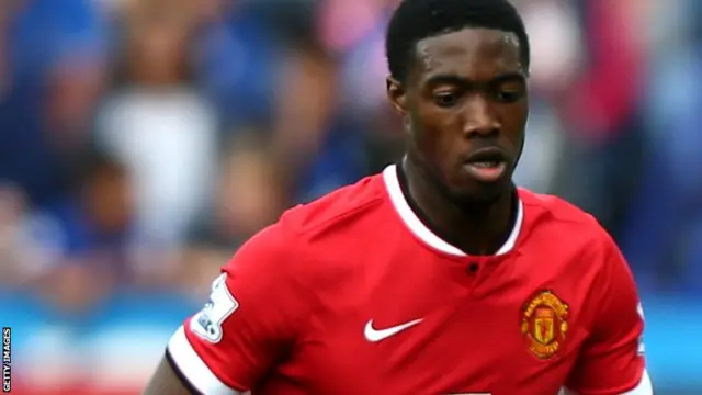 Manchester United defender Tyler Blackett watches the ball