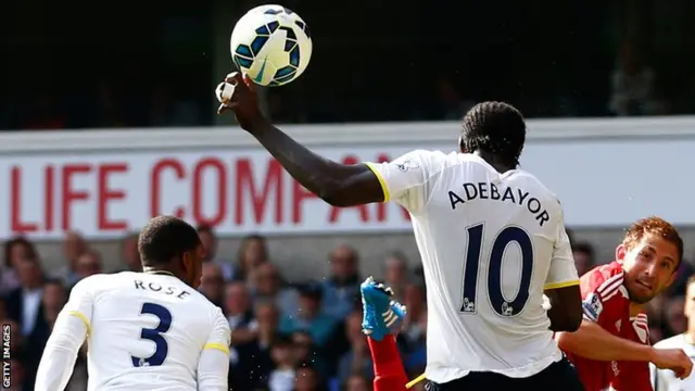 Emmanuel Adebayor appears to handle the ball against West Brom