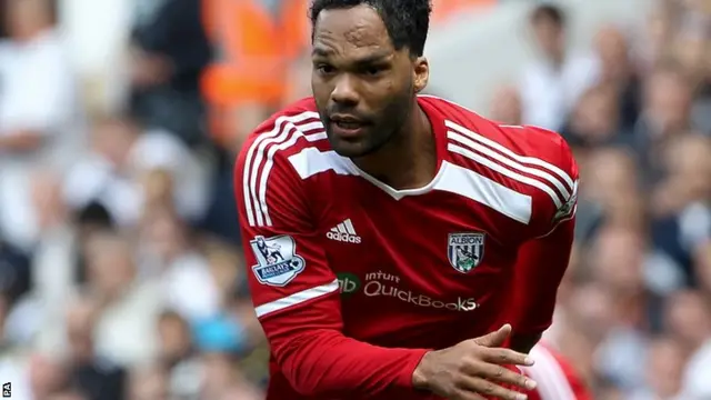 West Brom defender Joleon Lescott chases the ball