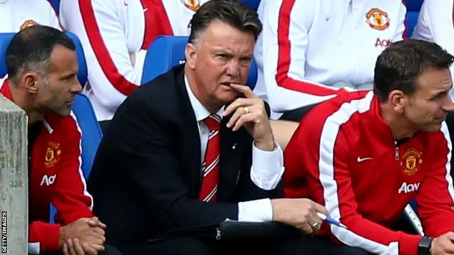 Manchester United manager Louis van Gaal watches his team