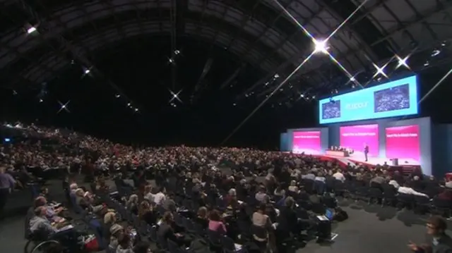 A wide-shot of the Labour conference hall during Jim Murphy's speech