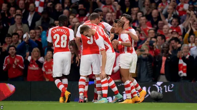 Arsenal celebrate their first goal of the evening against Southampton