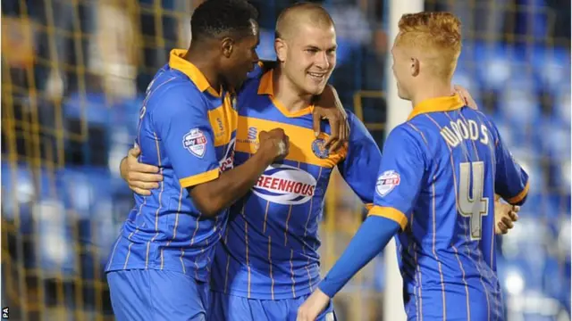 Shrewsbury celebrate James Collins goal against Norwich