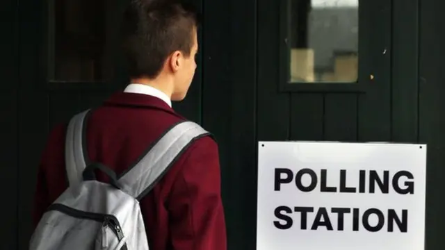 Teenager at polling station