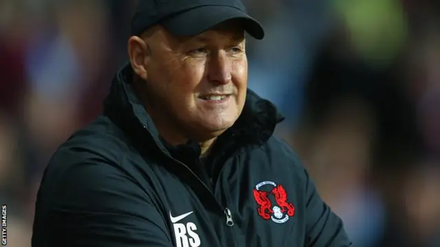 Russell Slade looks on from the Leyton Orient dugout