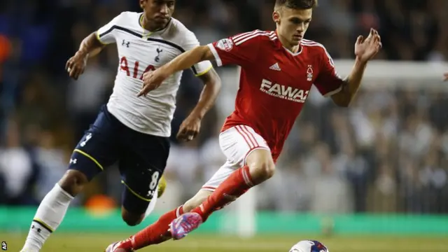 Nottingham Forest's Jamie Paterson dribbles past Spurs' Paulinho