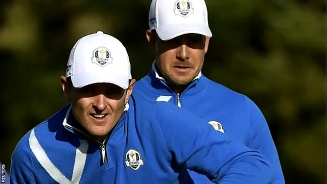 European Ryder Cup players Henrik Stenson (R) and Justin Rose