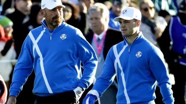 Europe's Thomas Bjorn, left, and Martin Kaymer, right,