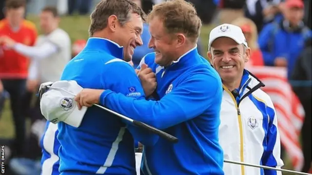 Lee Westwood (L) and Jamie Donaldson of Europe