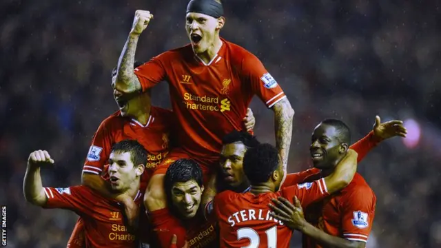 Liverpool celebrate during last season's 4-0 win over Everton at Anfield