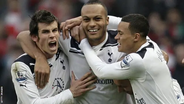 Tottenham celebrate winning at Arsenal in 2010