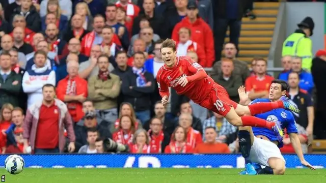 Gareth Barry tackles Adam Lallana