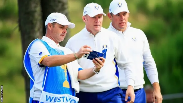 Caddie Billy Foster, Jamie Donaldson and Lee Westwood of Europe