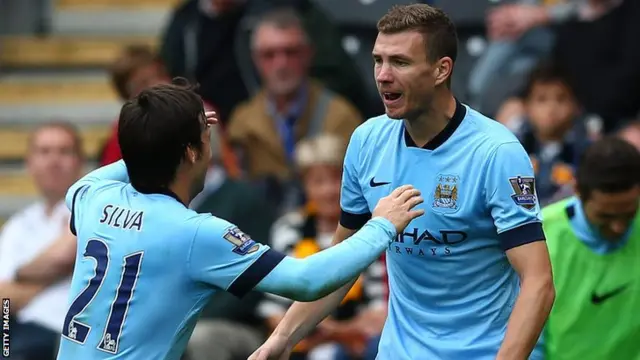 Edin Dzeko celebrates