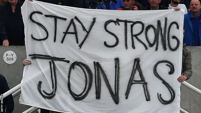 A banner in support of Newcastle player Jonas Gutierrez