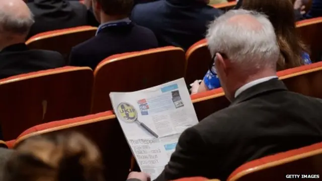 Man reading newspaper