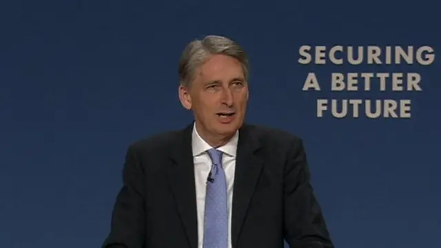 Philip Hammond addressing the conference