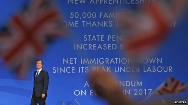 David Cameron enters the stage at the 2014 conference