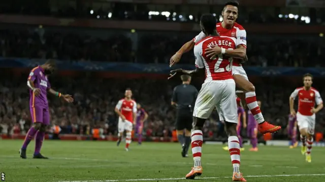 Danny Welbeck celebrates his hat-trick