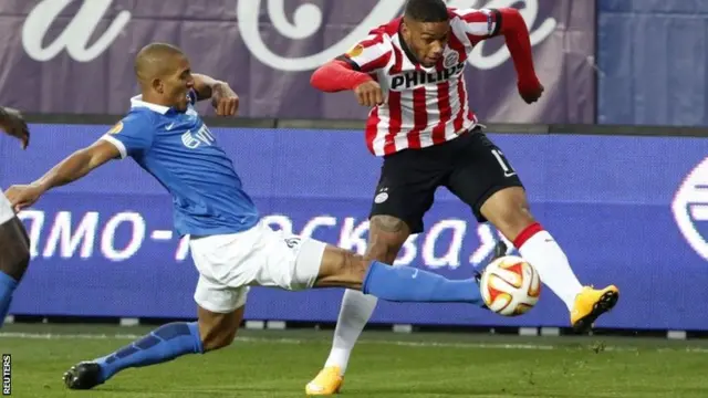 Dinamo Moscow's William Vainqueur (left) challenges PSV Eindhoven's Jurgen Locadia