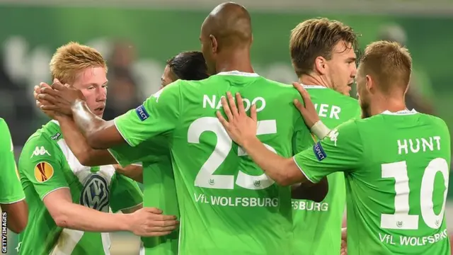 Wolfsburg celebrate Kevin de Bruyne's (left) goal