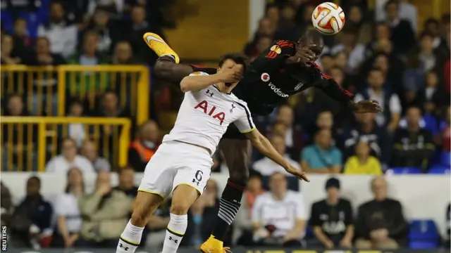 Demba Ba challenges for the ball