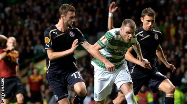 Celtic's Anthony Stokes takes on Marcelo Brozovic and Josip Pivaric at Celtic Park.