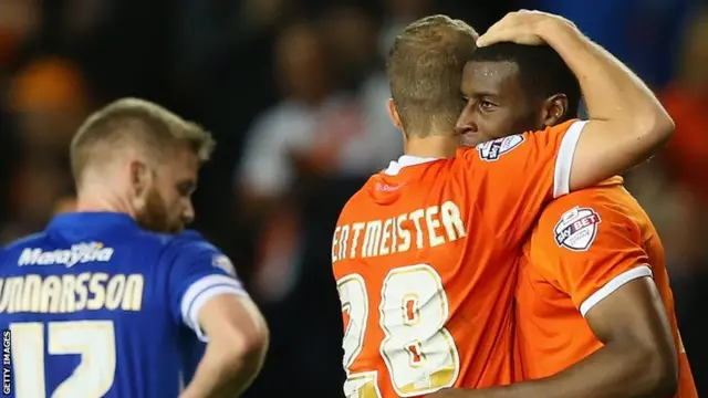 Jeffrey Rentmeister and Donveron Daniels of Blackpool celebrate