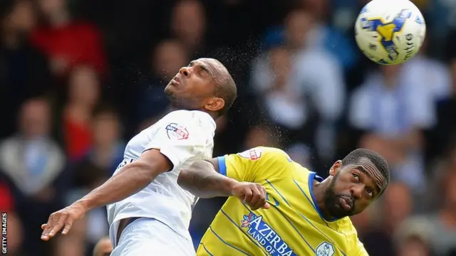 Leeds' Rodolph Austin and Sheffield Wednesday's Jacques Maghoma