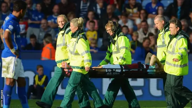 Burnley's Keiran Tripper is stretchered off