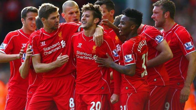 Liverpool players celebrate after Adam Lallana scores against West Brom