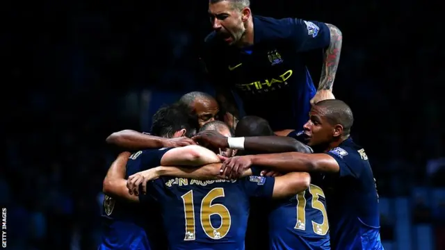 Manchester City celebrate their 2-0 win over Aston Villa