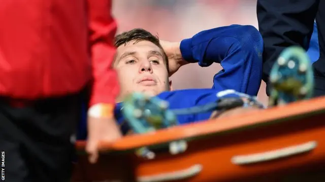 Everton defender John Stones goes off injured