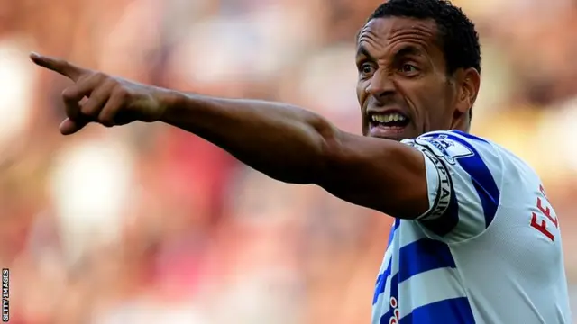 QPR captain Rio Ferdinand directs his team-mates