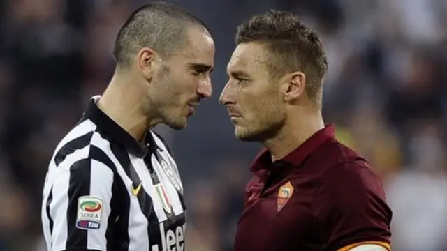 Leonardo Bonucci argues with AS Roma's Francesco Totti