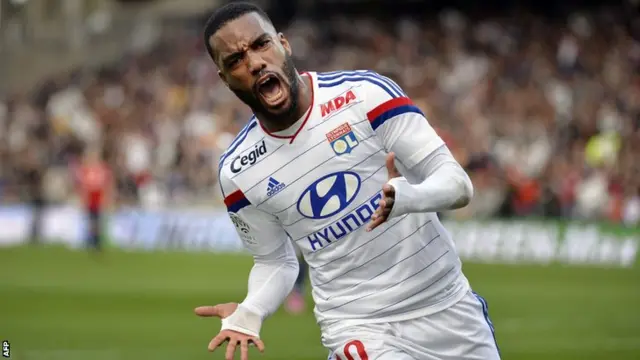 Lyon's Alexandre Lacazette celebrates