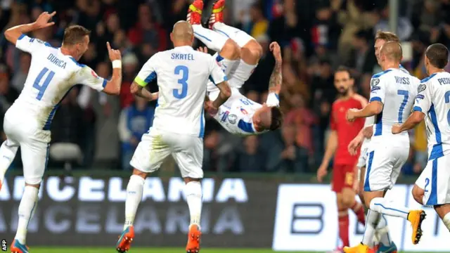 Slovakia celebrate a goal against Spain