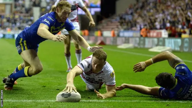 Joe Burgess scores a try for Wigan