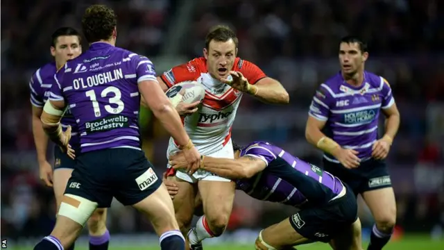 St Helens' James Roby tackled