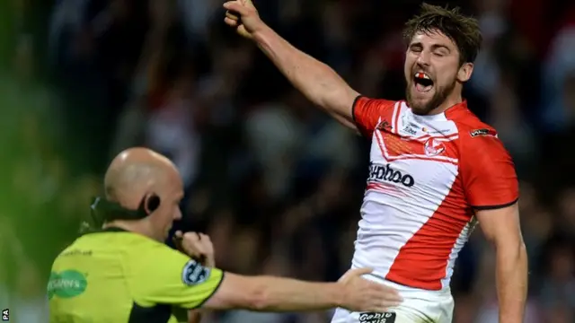 Tommy Makinson celebrates his try