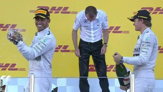 Champagne celebration on the podium