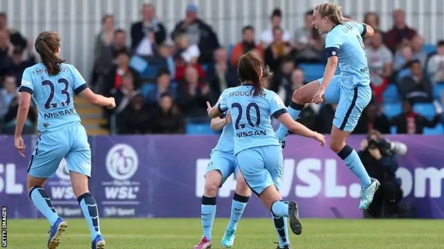 Toni Duggan celebrates