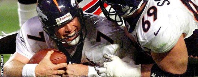 Denver Broncos quarterback John Elway celebrates a touchdown in the 1999 Superbowl - his team won 34-19 against Atlanta Falcons in Miami