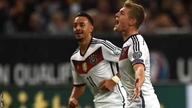 Toni Kroos celebrates Germany's goal against the Republic of Ireland