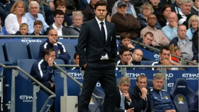 Mauricio Pochettino looks on