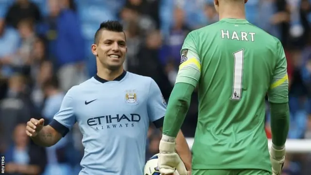 Sergio Aguero and Joe Hart celebrate